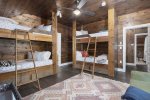 Bunk room has two original bunk bed and a sofa sleeper